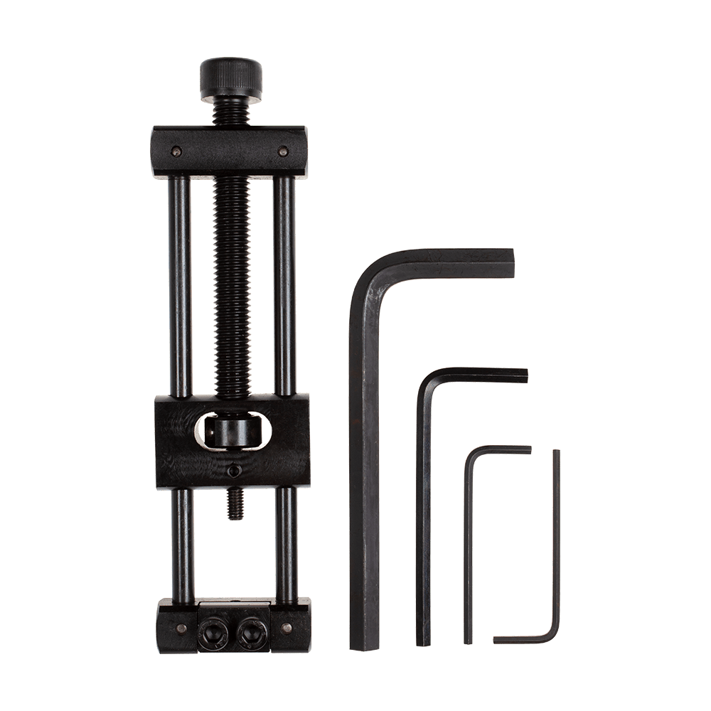 Designa Dart Repointer Black Pro Edition - Changeur de pointe Zu sehen ist der Designa Dart Repointer Black Pro Edition - Spitzenwechsler. Das Gerät ermöglicht das Austauschen von Spitzen an Darts.