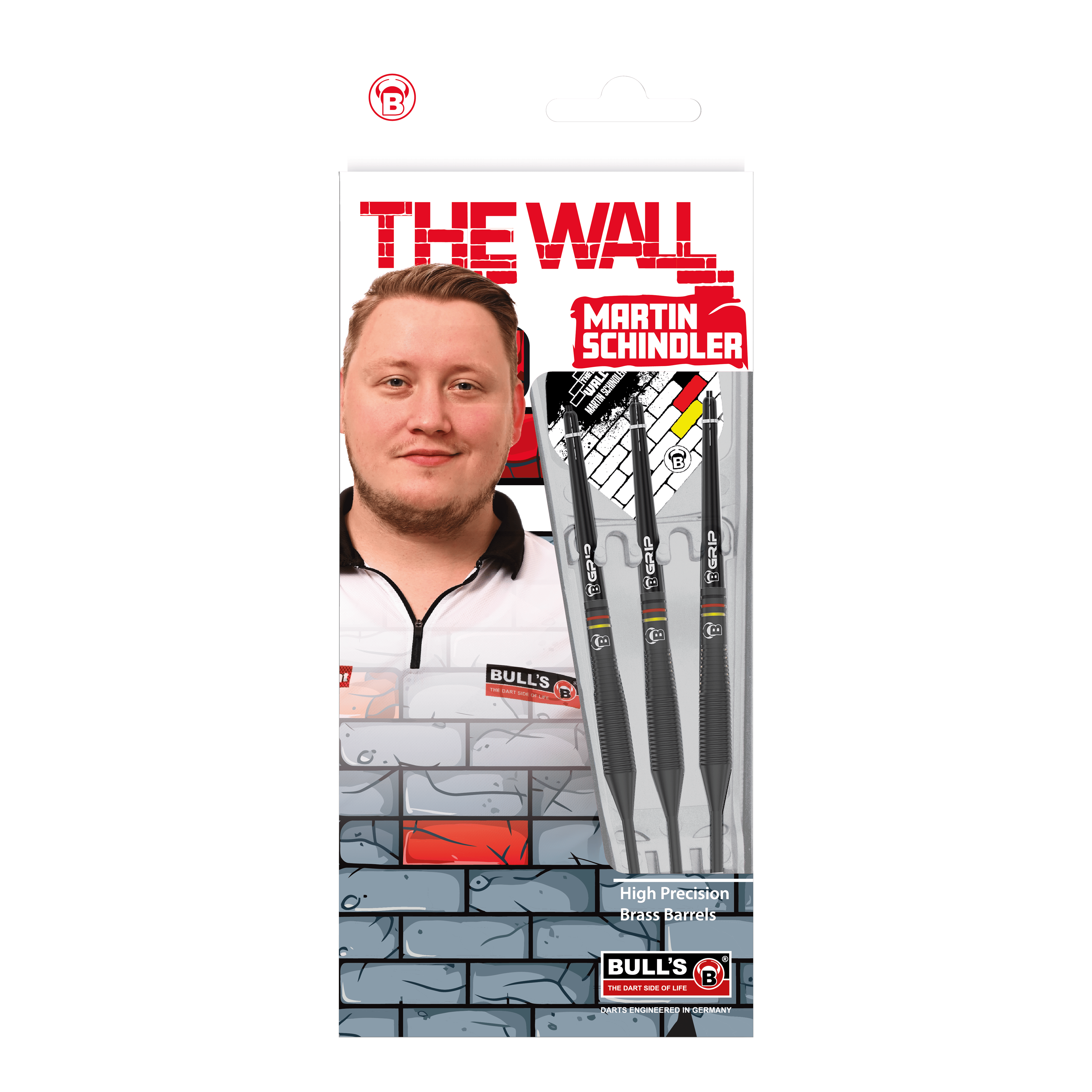 Taureaux Martin Schindler Le Mur Fléchettes en laiton noir Auf dem Bild ist die Verpackung der "Bulls Martin Schindler The Wall Black Brass Steeldarts" zu sehen. Auf der Vorderseite sind das Produkt, ein Porträt von Martin Schindler und das Markenlogo abgebildet.