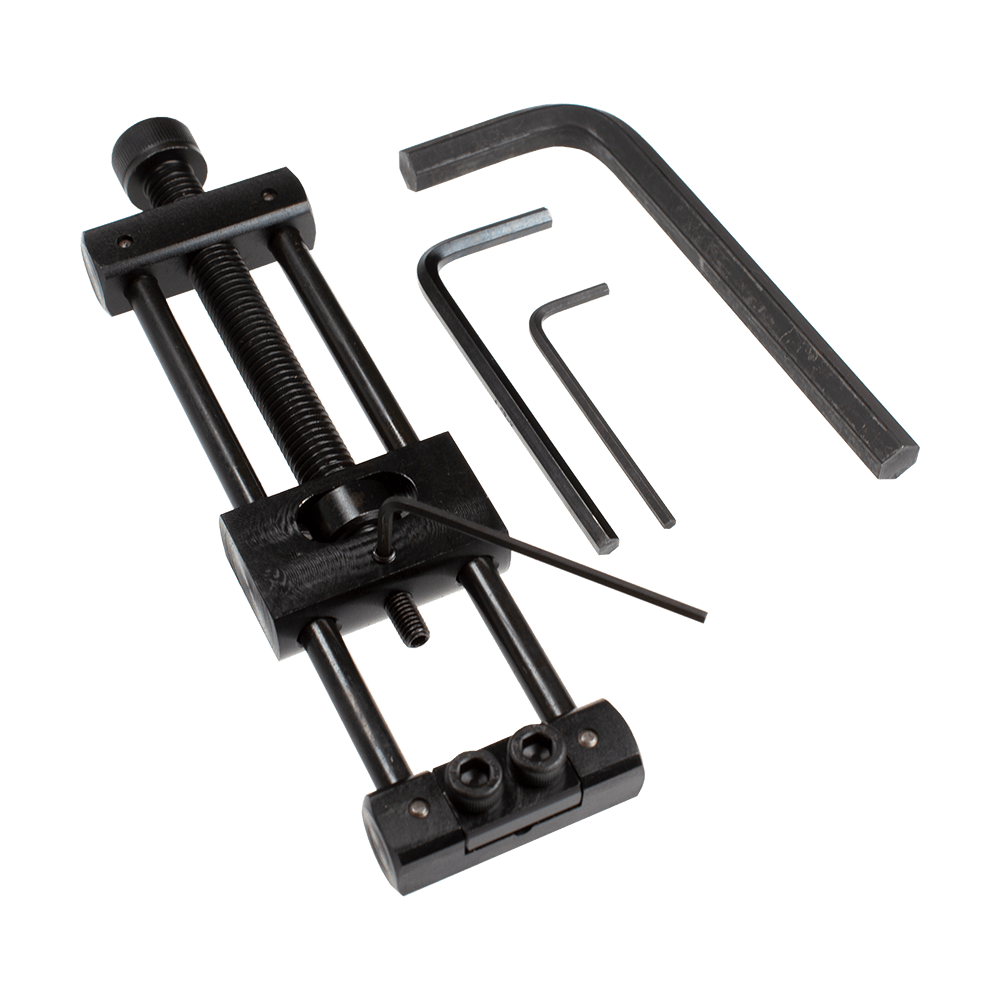 Designa Dart Repointer Black Pro Edition - Changeur de pointe Dieses Bild zeigt den Designa Dart Repointer Black Pro Edition - Spitzenwechsler. Es handelt sich um ein Werkzeug zum Austausch von Dartspitzen in schwarzem Design.