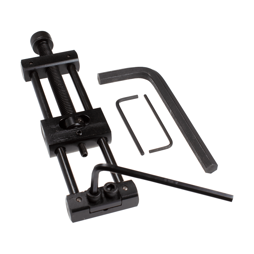 Designa Dart Repointer Black Pro Edition - Changeur de pointe Das Bild zeigt den Designa Dart Repointer Black Pro Edition - Spitzenwechsler. Es handelt sich um ein Werkzeug für Dartspieler zum Wechseln der Spitzen.