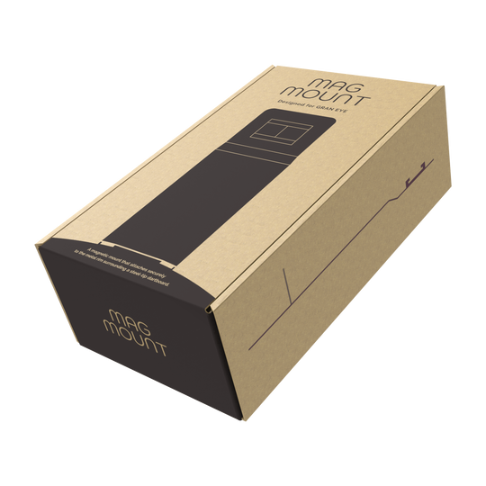 Support magnétique GranDarts Gran Eye Die Abbildung zeigt eine Verpackung des Produkts "GranDarts GranEye Mag Mount Befestigung". Die Schachtel ist aus braunem Karton und trägt die Aufschrift "Mag Mount".
