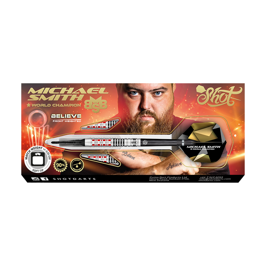Shot Michael Smith Croyez aux fléchettes souples Auf dem Bild ist eine Verpackung für Softdarts mit dem Namen "Michael Smith Believe" zu sehen. Im Hintergrund ist ein Porträt eines Mannes mit Bart abgebildet.