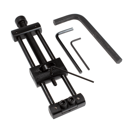 Designa Dart Repointer Black Pro Edition - Changeur de pointe Dieses Bild zeigt den Designa Dart Repointer Black Pro Edition - Spitzenwechsler. Es handelt sich um ein Werkzeug zum Austausch von Dartspitzen in schwarzem Design.