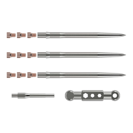 Kit de démarrage Caliburn Das Bild zeigt das Caliburn Starter-Kit mit mehreren metallischen Komponenten. Zu sehen sind lange, spitze Stäbe, kleine Schrauben sowie zwei weitere Werkzeugteile.