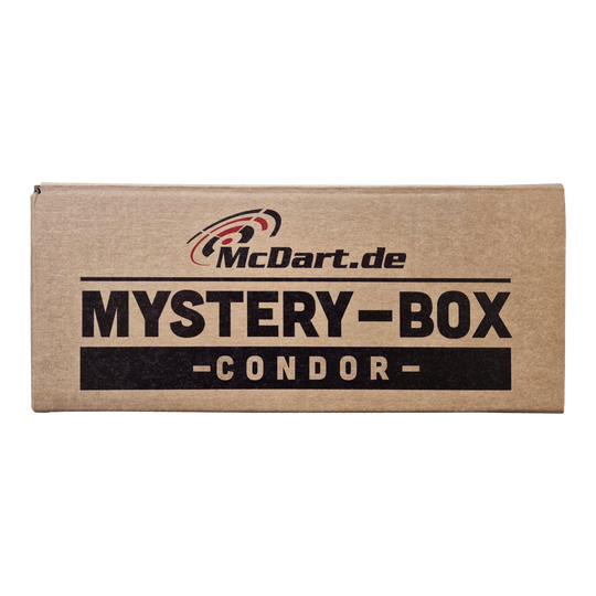 Boîte mystère McDart Condor Auf dem Bild ist ein brauner Karton mit der Aufschrift "McDart.de Mystery-Box - Condor -" zu sehen. Die Schachtel wirkt geheimnisvoll und lädt zum Entdecken ein.