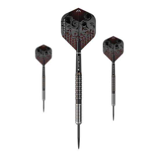 Das Bild zeigt drei Steeldarts des Produkts "Mission Makara M1". Die Dartpfeile haben ein silber-schwarzes Design mit auffälligen, gemusterten Flights.