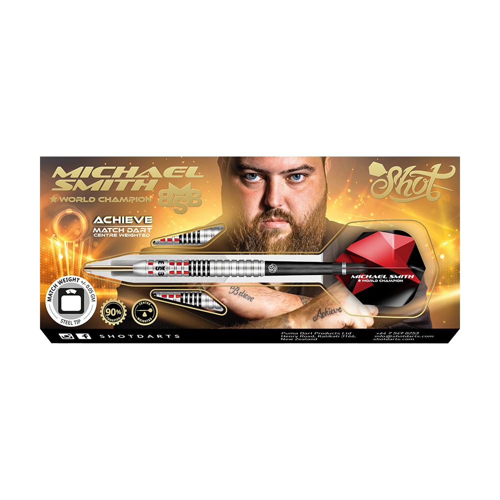 Shot Michael Smith atteint des fléchettes en acier Auf dem Bild ist eine Verpackung für Steeldarts mit dem Namen „Michael Smith - World Champion“ zu sehen. In der Mitte ist ein Mann mit Bart abgebildet, und ein großer silberner Dartpfeil ist prominent dargestellt.